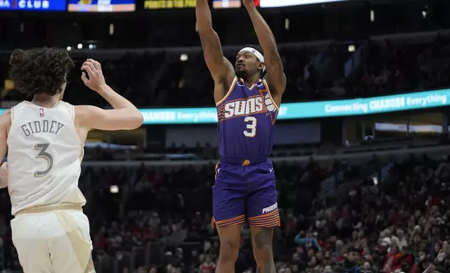 Phoenix Suns guard Bradley Beal (3) sinks a three-point shot during the second half of an NBA basketball game against the Chicago Bulls, Saturday, Feb. 22, 2025, in Chicago. (AP Photo/Erin Hooley)