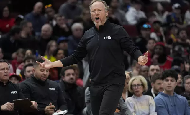 Phoenix Suns head coach Mike Budenholzer reacts to a call during the first half of an NBA basketball game against the Chicago Bulls, Saturday, Feb. 22, 2025, in Chicago. (AP Photo/Erin Hooley)