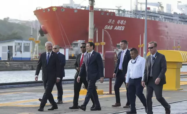 U.S. Secretary of State Marco Rubio and Panama Canal Authority Administrator Ricuarte Vásquez, left, tour the Miraflores Locks at the Panama Canal in Panama City, Sunday, Feb. 2, 2025. (AP Photo/Mark Schiefelbein, Pool)