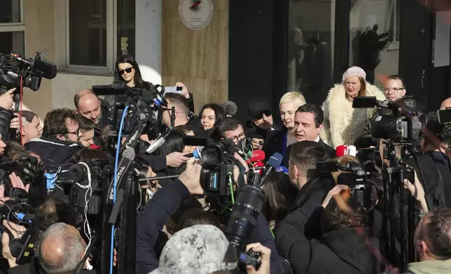 Albin Kurti, President of the left-wing Vetevendosje! party, makes statements outside a voting station as Kosovo holds a parliamentary election in Pristina, Kosovo, Sunday, Feb. 9, 2025. (AP Photo/Vlasov Sulaj)