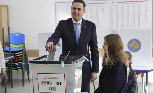 Lumir Abdixhiku, Leader of Democratic League of Kosovo party, casts his ballot during parliamentary election in Pristina, Kosovo, Sunday, Feb. 9, 2025. (AP Photo/Vlasov Sulaj)
