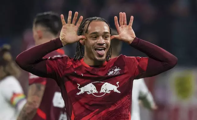 Leipzig's Xavi Simons celebrates after scoring during a Bundesliga soccer match against St. Pauli in Leipzig, Germany, Sunday, Feb. 9, 2025. (Jan Woitas/dpa via AP)