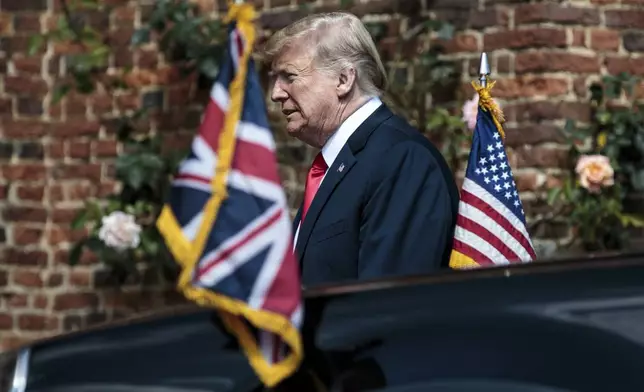 FILE - President Donald Trump arrives to meet British Prime Minister Theresa May before their meeting at Chequers, in Buckinghamshire, England, July 13, 2018. (Jack Taylor/Pool Photo via AP, File)