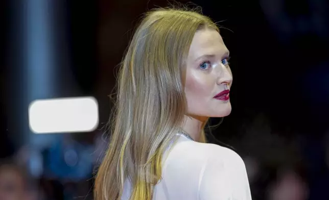 Model Toni Garrn poses for photographers upon arrival at the opening of the International Film Festival, Berlinale, in Berlin, Thursday, Feb. 13, 2025. (AP Photo/Markus Schreiber)