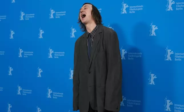 Lars Eidinger poses for photographers at the photo call for the film 'Das Licht' at the International Film Festival, Berlinale, in Berlin, Thursday, Feb. 13, 2025. (AP Photo/Markus Schreiber)