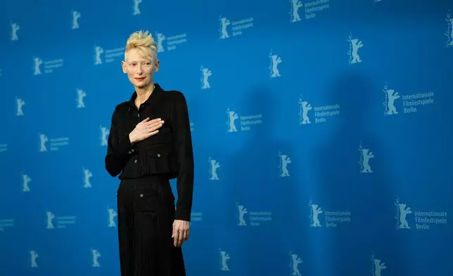 Tilda Swinton poses for photographers at the photo call for her Honorary Golden Bear for lifetime achievement at the International Film Festival, Berlinale, in Berlin, Friday, Feb. 14, 2025. (AP Photo/Markus Schreiber).