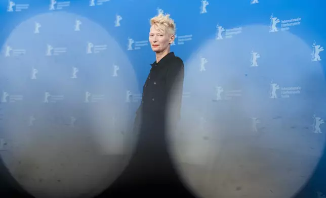 Tilda Swinton poses for photographers at the photo call for her Honorary Golden Bear for lifetime achievement at the International Film Festival, Berlinale, in Berlin, Friday, Feb. 14, 2025. (AP Photo/Markus Schreiber).