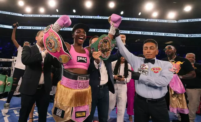 FILE - Middleweight champion Claressa Shields celebrates after defeating reigning WBC women's heavyweight boxing champion Vanessa Lepage-Joanisse of Quebec during a fight, Saturday, July 27, 2024, in Detroit. (AP Photo/Carlos Osorio, File)