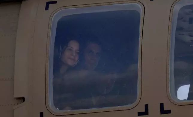 Israeli Ofer Kalderon, who has been held hostage by Hamas in Gaza since October 7, 2023, is seen inside an Israeli helicopter as they land at Sheba medical Center in Ramat Gan, Saturday Feb. 1, 2025. (AP Photo/Ariel Schalit)