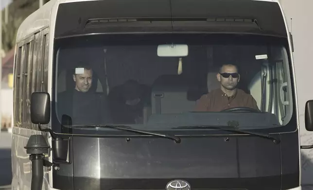 Palestinian prisoners cross at Rafah border crossing, Egypt, Saturday, Feb. 1, 2025. (AP Photo/Amr Nabil)