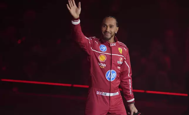 Ferrari driver Lewis Hamilton of Britain attends the F1 75 Live launch event at the O2 arena in London, Tuesday, Feb. 18, 2025. (AP Photo/Kin Cheung)