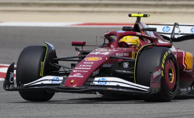 Ferrari driver Lewis Hamilton of Britain in action during a Formula One pre-season test at the Bahrain International Circuit in Sakhir, Bahrain, Wednesday, Feb. 26, 2025. (AP Photo/Darko Bandic)