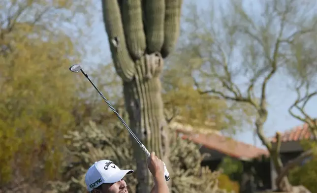 Rasmus Højgaard, of Denmark, hits his second shot at the second hole during the third round of the Phoenix Open golf tournament at TPC Scottsdale Saturday, Feb. 8, 2025, in Scottsdale, Ariz. (AP Photo/Ross D. Franklin)