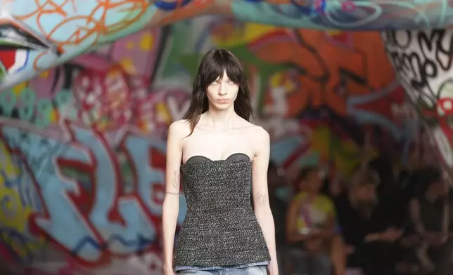 A model wears a creation of the Diesel Fall/Winter 2025-2026 women's collection presented in Milan, Italy, Wednesday, Feb. 26, 2025. (AP Photo/Antonio Calanni)