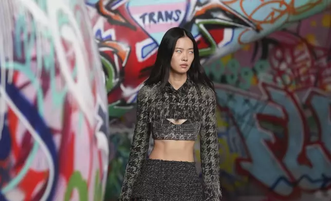 A model wears a creation of the Diesel Fall/Winter 2025-2026 women's collection presented in Milan, Italy, Wednesday, Feb. 26, 2025. (AP Photo/Antonio Calanni)