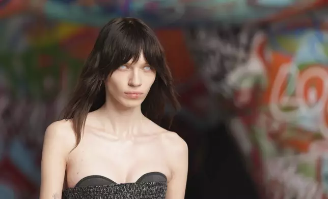 A model wears a creation of the Diesel Fall/Winter 2025-2026 women's collection presented in Milan, Italy, Wednesday, Feb. 26, 2025. (AP Photo/Antonio Calanni)