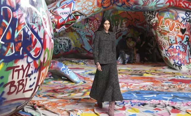 A model wears a creation of the Diesel Fall/Winter 2025-2026 women's collection presented in Milan, Italy, Wednesday, Feb. 26, 2025. (AP Photo/Antonio Calanni)