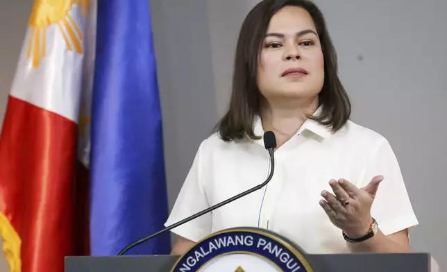 FILE - Philippine Vice President Sara Duterte gestures as she speaks during a press conference in Manila, Philippines on Friday, Feb. 7, 2025. (AP Photo/Basilio Sepe, File)