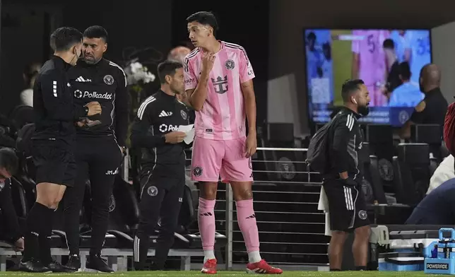 Inter Miami midfielder Tomas Aviles (6) leaves the game after being shown a red card during the first half of an MLS soccer match against New York City FC, Saturday, Feb. 22, 2025, in Fort Lauderdale, Fla. (AP Photo/Rebecca Blackwell)