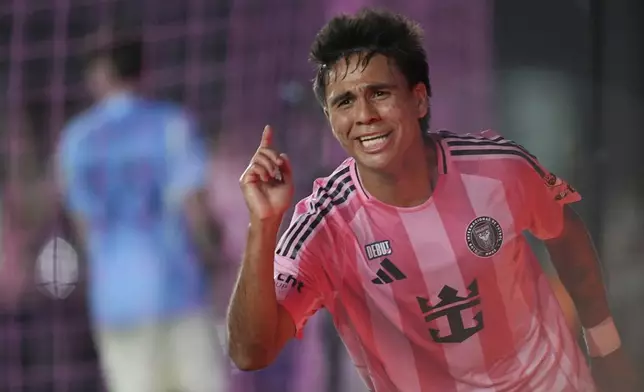 Inter Miami midfielder Telasco Segovia (8) celebrates scoring his side's second goal against New York City FC to tie the game, in the final minutes of stoppage time of an MLS soccer match, Saturday, Feb. 22, 2025, in Fort Lauderdale, Fla. (AP Photo/Rebecca Blackwell)
