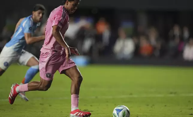 Inter Miami midfielder Telasco Segovia lines up to score his side's second goal against New York City FC, to tie the game in the final minutes of stoppage time of an MLS soccer match, Saturday, Feb. 22, 2025, in Fort Lauderdale, Fla. (AP Photo/Rebecca Blackwell)
