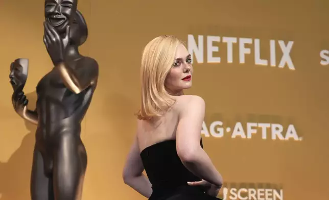 Elle Fanning arrives at the 31st annual Screen Actors Guild Awards on Sunday, Feb. 23, 2025, at the Shrine Auditorium in Los Angeles. (AP Photo/Chris Pizzello)