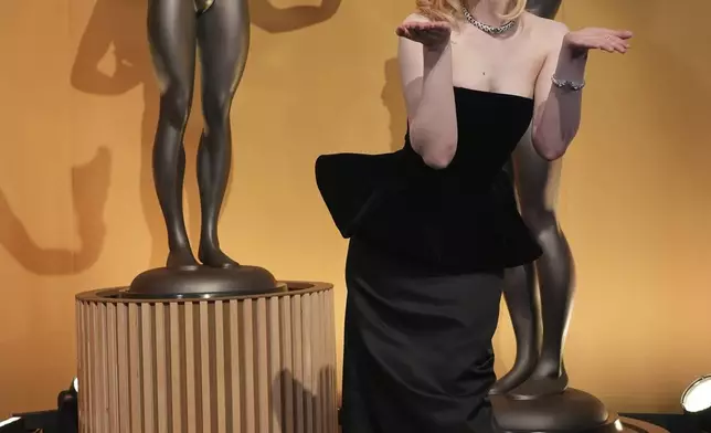 Elle Fanning arrives at the 31st annual Screen Actors Guild Awards on Sunday, Feb. 23, 2025, at the Shrine Auditorium in Los Angeles. (AP Photo/Chris Pizzello)