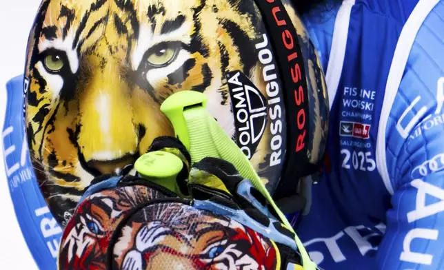 Italy's Federica Brignone celebrates at the finish area winning a women's giant slalom, at the Alpine Ski World Championships, in Saalbach-Hinterglemm, Austria, Thursday, Feb. 13, 2025 (Jean-Christophe Bott/Keystone via AP)