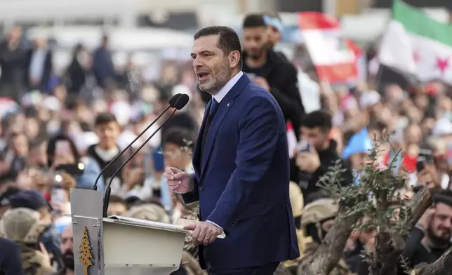 Former Lebanese Prime Minister Saad Hariri speaks during a ceremony to mark the 20th anniversary of the assassination of his father, former Prime Minister Rafik Hariri after he paid his respects at the grave of his father, in Beirut, Lebanon, Friday, Feb. 14, 2025. (AP Photo/Hassan Ammar)