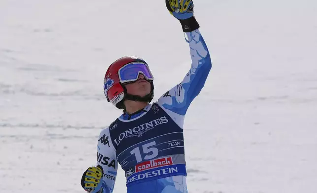 United States' Lauren Macuga celebrates at the finish area of a downhill run of a women's team combined event, at the Alpine Ski World Championships, in Saalbach-Hinterglemm, Austria, Tuesday, Feb. 11, 2025. (AP Photo/Giovanni Auletta)