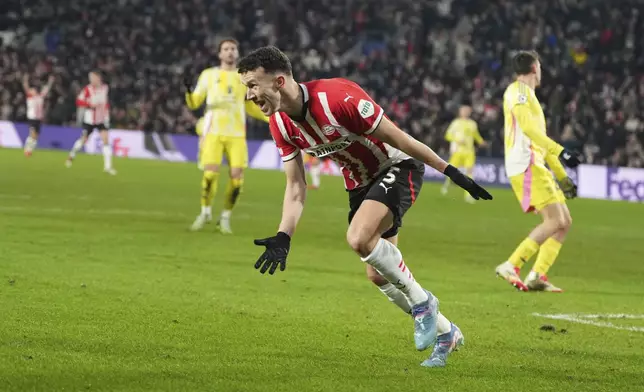 PSV's Ivan Perisic celebrates after scoring his side's opening goal during the Champions League playoff second leg soccer match between PSV and Juventus at Phillips Stadium in Eindhoven, Netherlands, Wednesday, Feb.19, 2025. (AP Photo/Peter Dejong)
