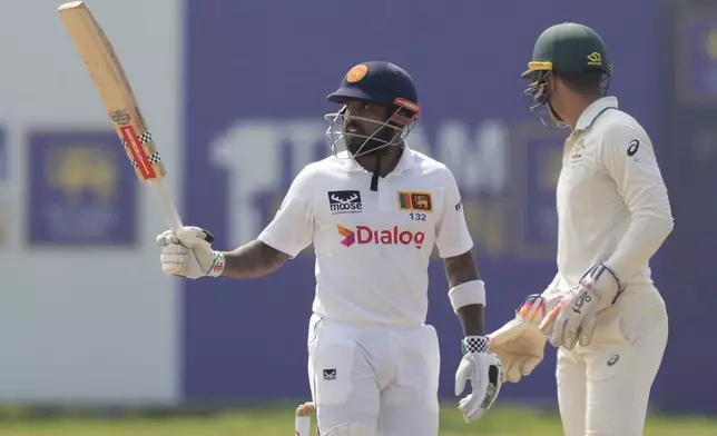 Sri Lanka's Kusal Mendis celebrates his fifty runs during day four of the second test cricket match between Sri Lanka and Australia in Galle, Sri Lanka, Sunday, Feb. 9, 2025. (AP Photo/Eranga Jayawardena)