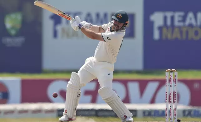 Australia's Travis Head plays a shot during day four of the second test cricket match between Sri Lanka and Australia in Galle, Sri Lanka, Sunday, Feb. 9, 2025. (AP Photo/Eranga Jayawardena)