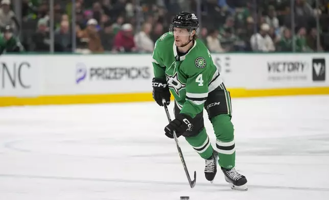 Dallas Stars defenseman Miro Heiskanen skates with the puck against the Vegas Golden Knights during the first period of an NHL game Friday, Jan. 24, 2025, in Dallas. (AP Photo/Julio Cortez)