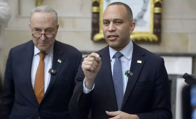 FILE - House Minority Leader Hakeem Jeffries, D-N.Y., right, is joined by Senate Minority Leader Chuck Schumer, D-N.Y., for a press conference in Statuary Hall at the Capitol, Feb. 12, 2025, in Washington. (AP Photo/Rod Lamkey, Jr., File)