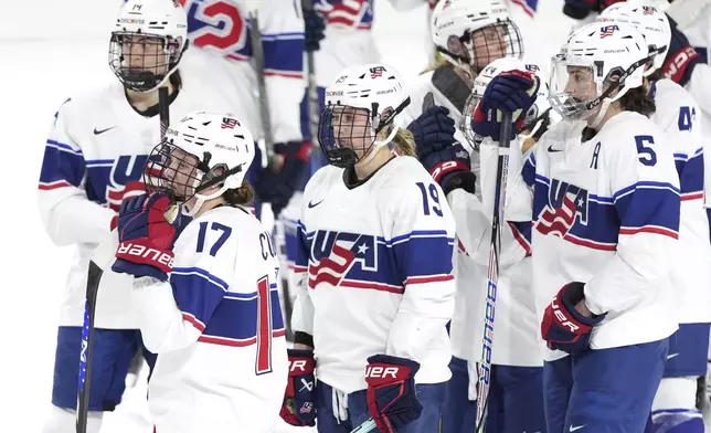 Members of Team USA react following their 3-1 loss to Team Canada in the final game of Rivalry Series hockey action in Summerside, Canada, on Saturday, Feb. 8, 2025. (Darren Calabrese/The Canadian Press via AP)