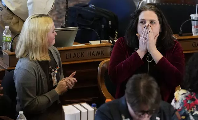 Rep. Aime Wichtendahl, D-Hiawatha, reacts after speaking during debate on the gender identity bill, Thursday, Feb. 27, 2025, at the Statehouse in Des Moines, Iowa. (AP Photo/Charlie Neibergall)
