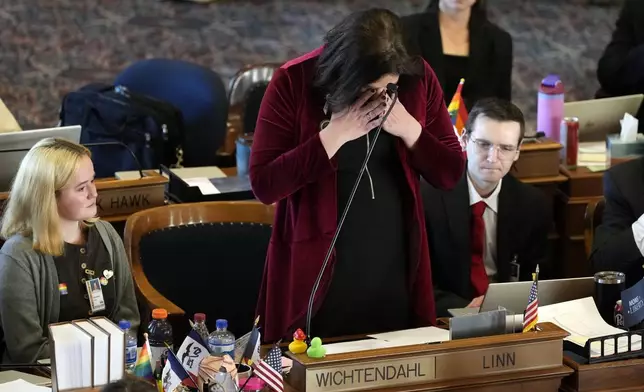 Rep. Aime Wichtendahl, D-Hiawatha, reacts after speaking during debate on the gender identity bill, Thursday, Feb. 27, 2025, at the Statehouse in Des Moines, Iowa. (AP Photo/Charlie Neibergall)