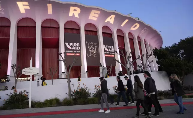A general view of atmosphere is pictured outside the Forum prior to the FireAid benefit concert on Thursday, Jan. 30, 2025, in Inglewood, Calif. (AP Photo/Chris Pizzello)