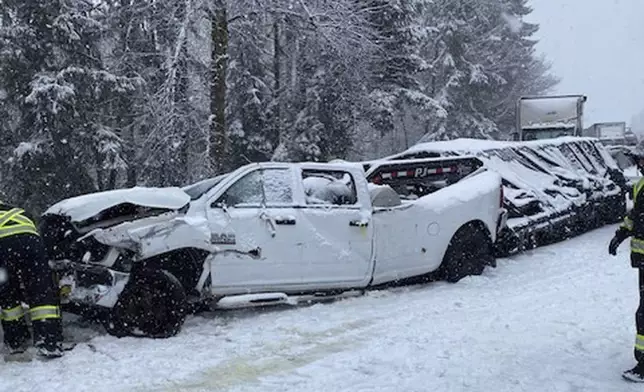 This photo provided by the Washington State Department of Transportation shows vehicles piled up on a snowy Interstate 5 highway in Southwestern Wash., Thursday, Feb. 13, 2025. (Washington State Department of Transportation via AP)