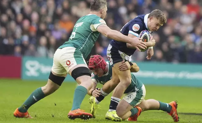 Scotland's Jack Dempsey in action during the Six Nations match between Scotland and Ireland at Murrayfield Stadium, Edinburgh, Sunday Feb. 9, 2025. (Andrew Milligan/PA via AP)