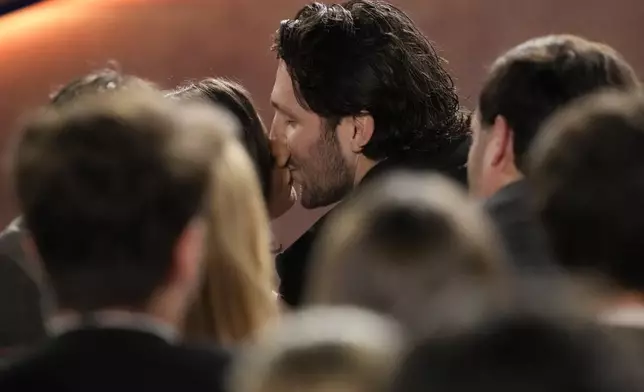 Buffalo Bills' Josh Allen kisses his fiancé Hailee Steinfeld during the NFL Honors award show ahead of the Super Bowl 59 football game, Thursday, Feb. 6, 2025, in New Orleans. (AP Photo/David J. Phillip)