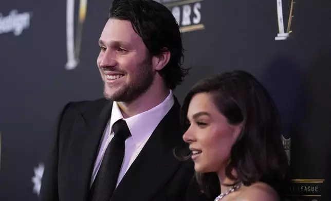 Josh Allen, of the Buffalo Bills, and his fiancé, Hailee Steinfeld, pose on the red carpet at the NFL Honors award show ahead of the Super Bowl 59 football game, Thursday, Feb. 6, 2025, in New Orleans. (AP Photo/Brynn Anderson)