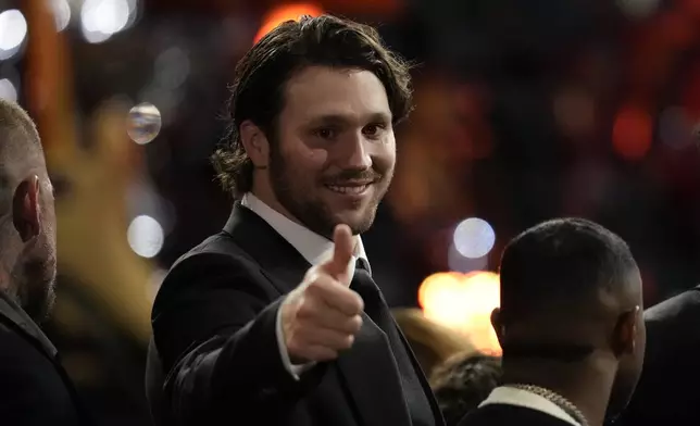 Buffalo Bills' Josh Allen gives a thumbs up during the NFL Honors award show ahead of the Super Bowl 59 football game, Thursday, Feb. 6, 2025, in New Orleans. (AP Photo/David J. Phillip)