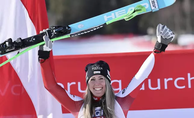 The winner Austria's Cornelia Huetter celebrates after an alpine ski, women's World Cup downhill, in Kvitfjell, Norway, Friday, Feb. 28, 2025. (AP Photo/Marco Trovati)