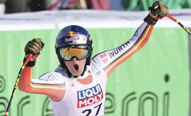 Germany's Emma Aicher reacts after completing an alpine ski, women's World Cup downhill, in Kvitfjell, Norway, Friday, Feb. 28, 2025. (AP Photo/Marco Trovati)