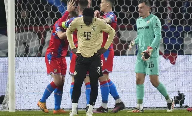 Plzen players celebrate after the Europa League playoff second leg soccer match between Viktoria Plzen and Ferencvaros at the Doosan Arena in Plzen, Czech Republic, Thursday, Feb. 20, 2025. (AP Photo/Petr David Josek)