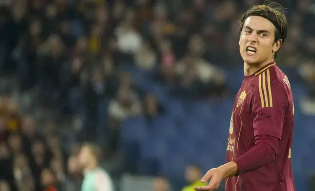 Roma's Paulo Dybala reacts during the Europa League playoff second leg soccer match between Roma and Porto at the Stadio Olimpico in Rome, Italy, Thursday, Feb. 20, 2025. (AP Photo/Gregorio Borgia)