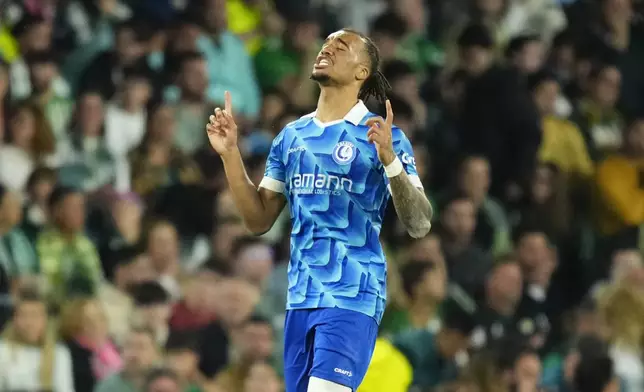 Gent's Archie Brown celebrates after scoring the opening goal during the Conference League playoff second leg soccer match between Betis and Gent at the Benito Villamarin stadium in Seville, Spain, Thursday Feb. 20, 2025. (AP Photo/Jose Breton)