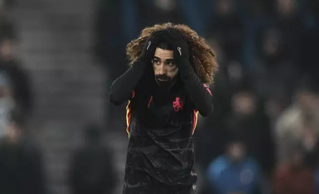 Chelsea's Marc Cucurella reacts during the English Premier League soccer match between Brighton and Chelsea in Brighton, England, Friday, Feb. 14, 2025. (AP Photo/Dave Shopland)